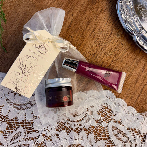 Cosmetic products on a lace doily with a wooden surface