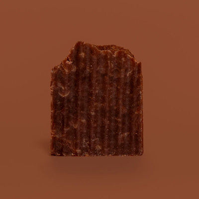 Brown textured block on a brown background