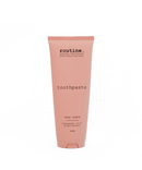 A pink tube of Routine brand toothpaste labeled 'Sexy Sadie' with cinnamon flavor, emphasizing natural ingredients.