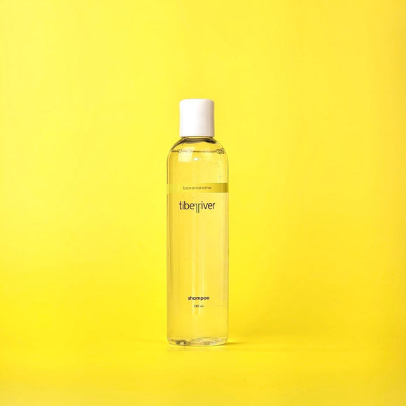 Yellow bottle of LibeRives shampoo on a yellow background