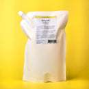 White plastic pouch with a label on a yellow background